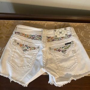 Miss Me shorty shorts.